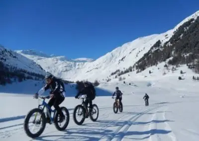 Fat bike or snow bike, an ideal bike for a ride along the snowy mountains of the Dolomites.