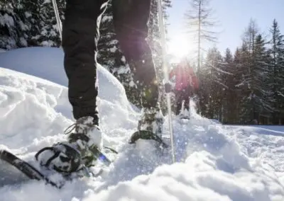 Snowshoeing in the Dolomites, in the silence of the wonderful snowy landscape