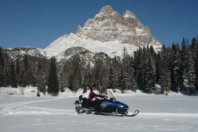 Snowmobile day excursion Dolomite mountains