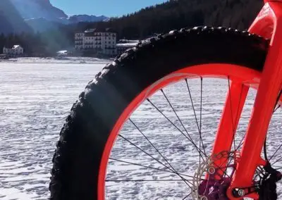 Fat bike Misurina Dolomite mountains, day tour in an outdoor activity nature excursion. to discover an environment that is intact