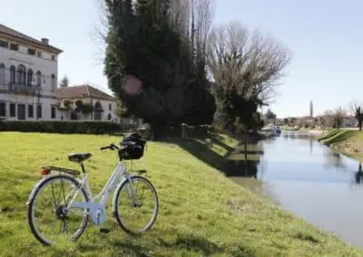 Bicycle ride Mira Brenta canal day excursion, during a visit of Venetian villas between Padua and Venice. Sightseeing in Italy