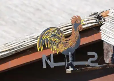 Rooster weathervane metalworking craft in the Veneto region, Italy. Visit during a themed day excursion with professional driver. Sightseeing in Italy