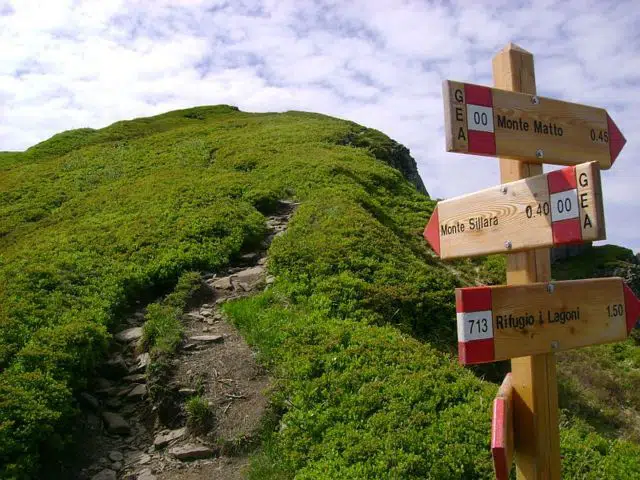 Track sign North Apennine mountains ridge, border of the Ligurian, Tuscan and Emilian regions of Italy,